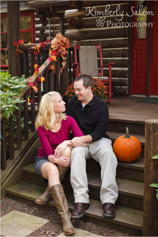 Jenna and Bob with pumpkin on porch