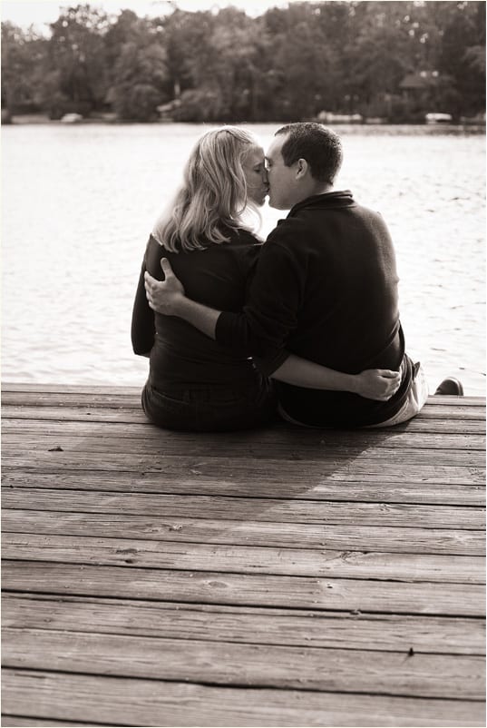 Jenna and Bob on dock kissing