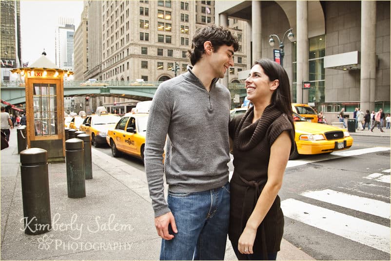 Sarah and David by Grand Central with taxis