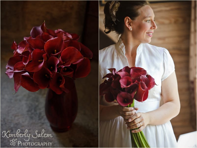 Tara in her dress and her bouquet of red calla lilies