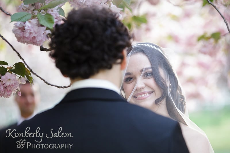 bride looks at groom during the wedding ceremony