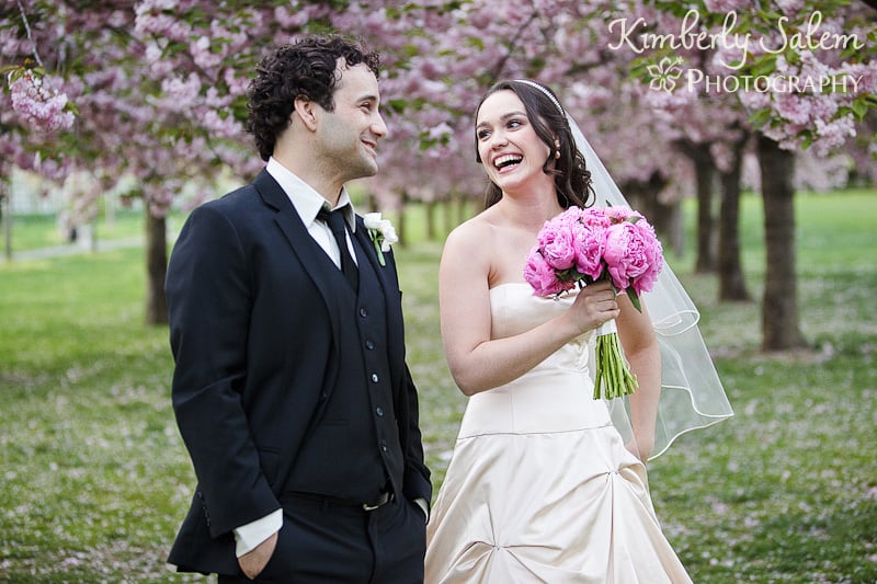 bride and groom portrait among the cherry blossoms