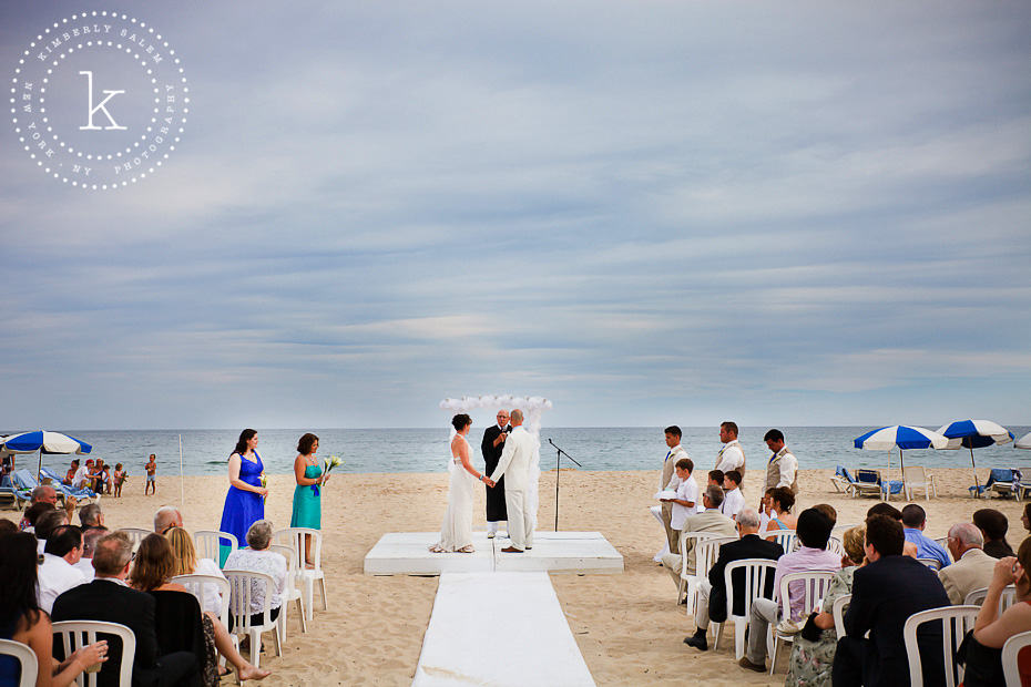 beach wedding with stormy sky