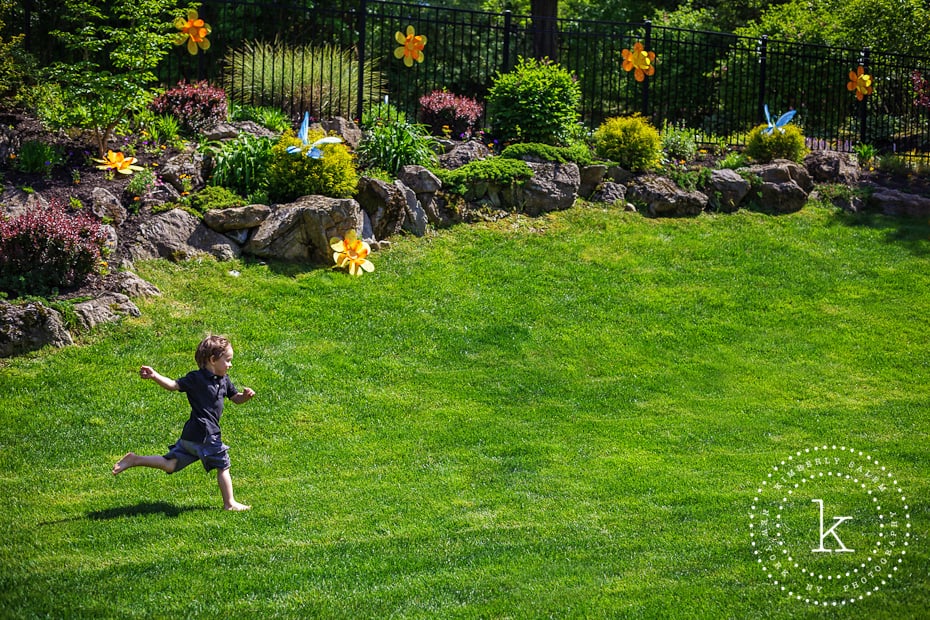 boy running on grass