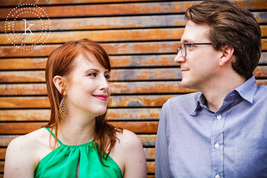 engaged couple - wood slat background