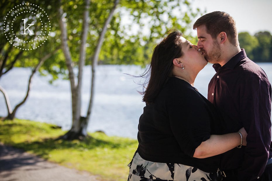 engaged couple kisssing - long island