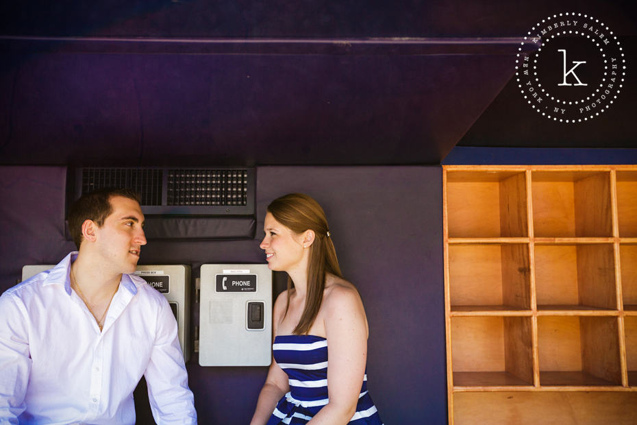 engaged couple in dugout at yankee stadium