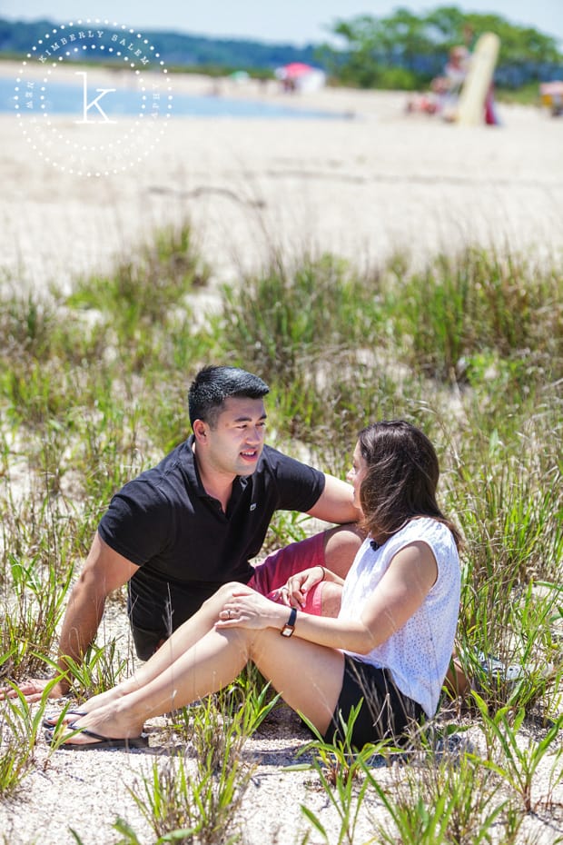 engaged couple at beach - with beach grass