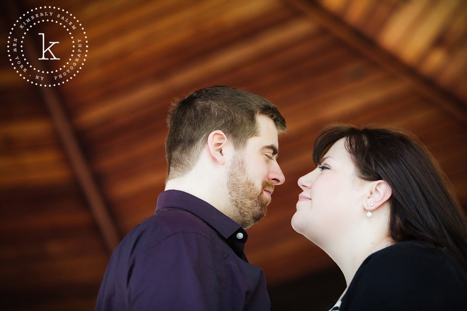 engaged couple looking at each other - close up