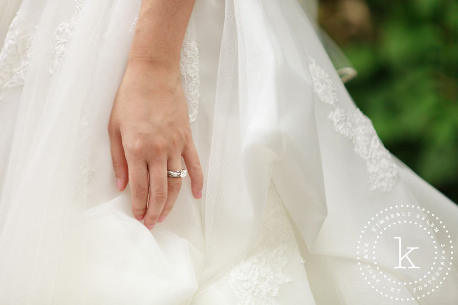 engagement ring detail with dress