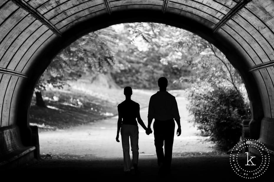 engaged couple - walking in Prospect Park - tunnel silhouette