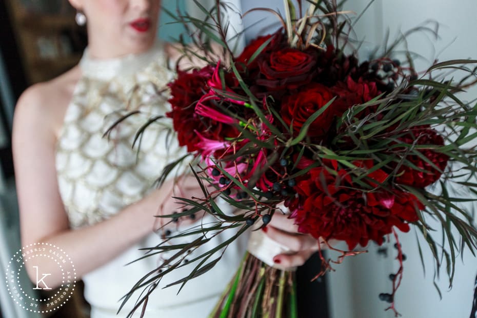 bride looking at her bouquet