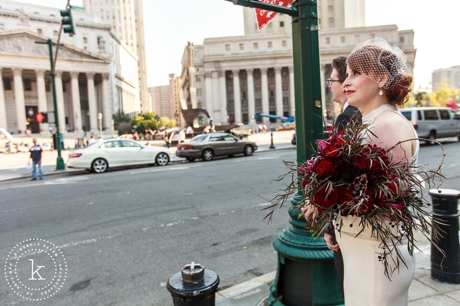 bride and groom on their way to NYC marriage bureau