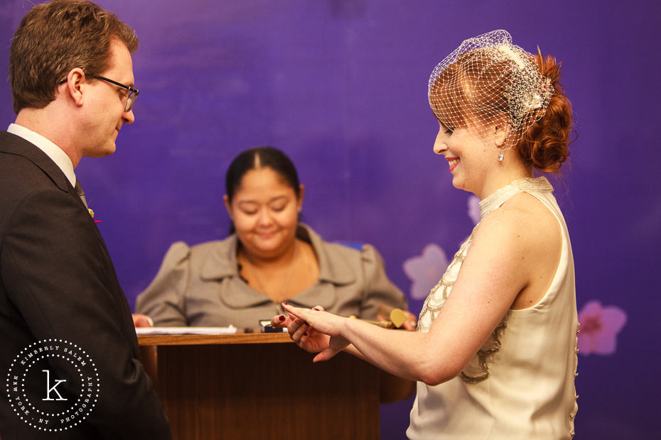 ceremony - bride checking out the ring - NYC marriage bureau