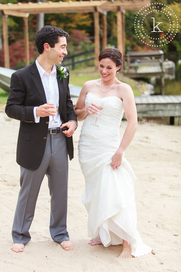 Barefoot bride and groom on the sand