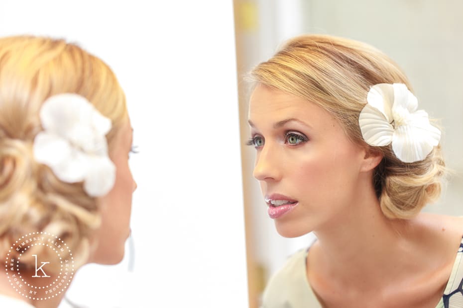 Bride checking her makeup