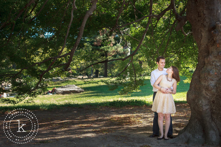 central park engagement photo under tree