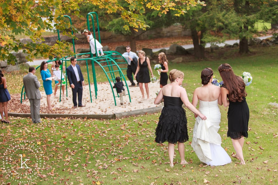 Bride and bridesmaids heading to playground