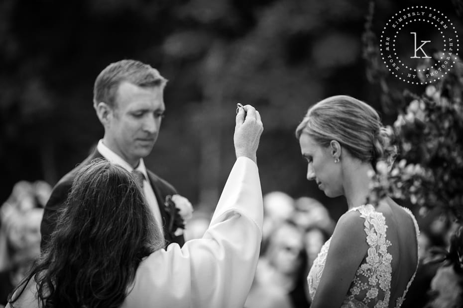 Officiant holding up rings