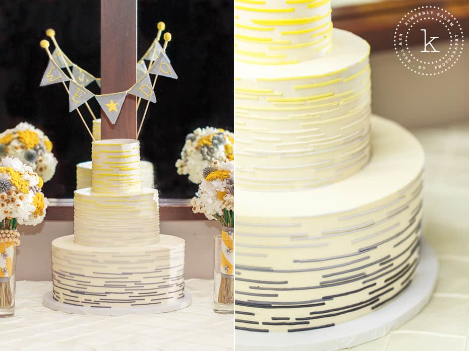 "We Do" banner on yellow and gray modern wedding cake