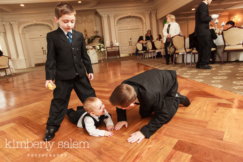 young boys having fun on the wedding dance floor