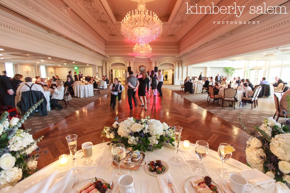 wide angle shot of wedding dance floor with flowers