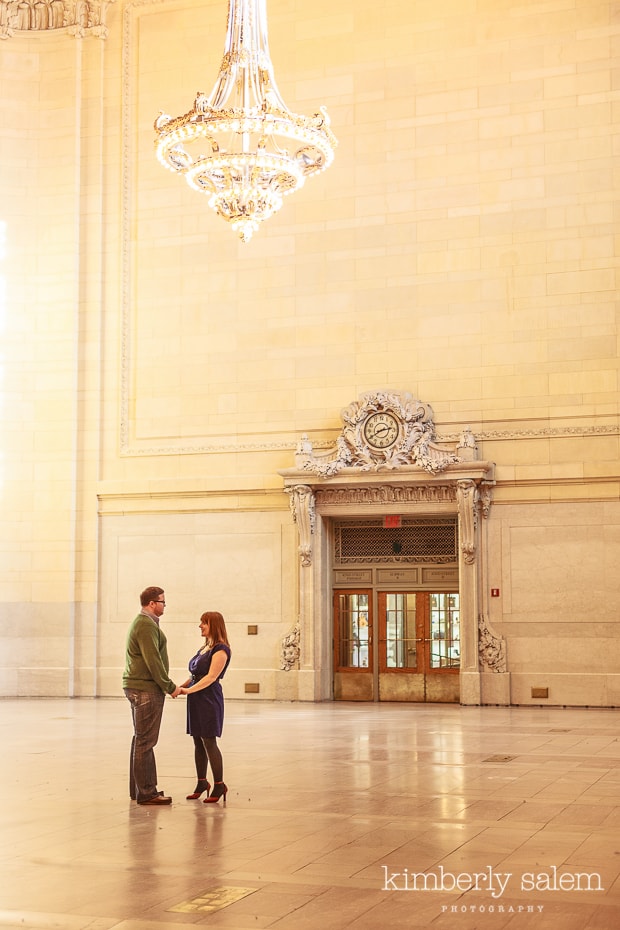 engaged couple in Grand Central station - chandelier