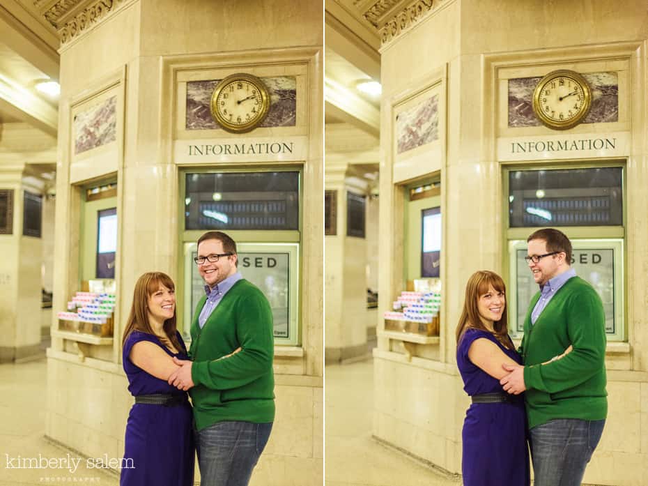 engaged couple by timetables in Grand Central