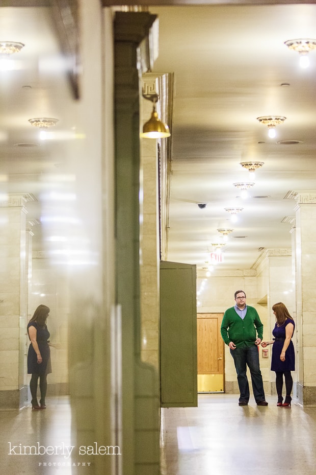 engaged couple in Grand Central in long hallway