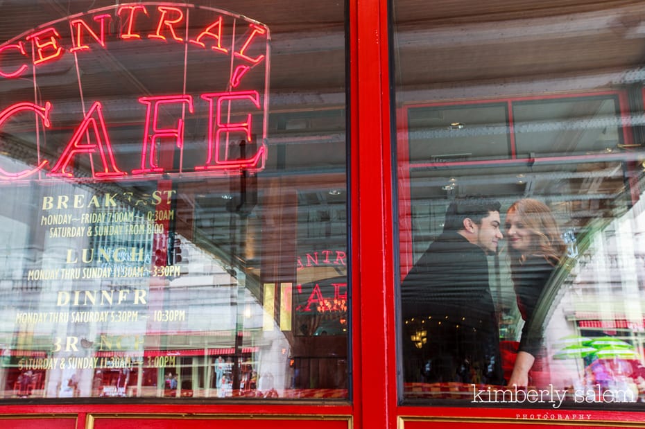 engaged couple in the window of diner near grand central in NYC