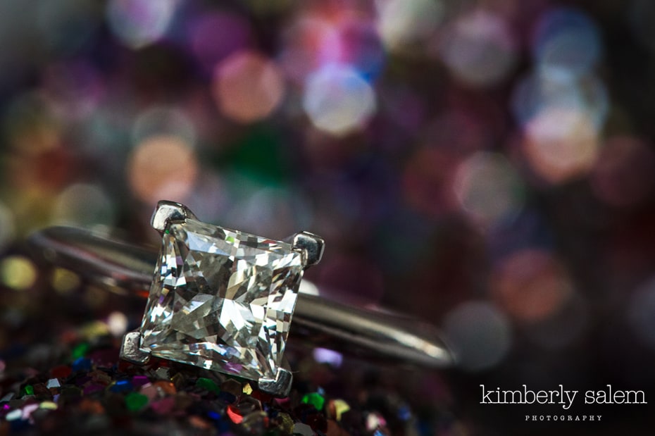 engagement ring with sparkly background