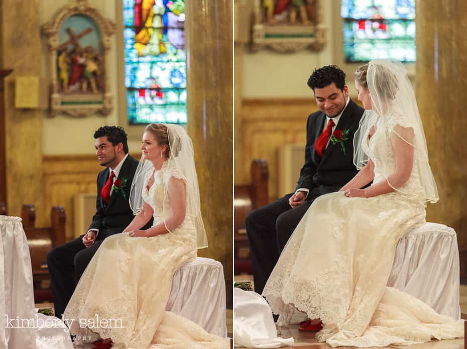 bride and groom smile during ceremony