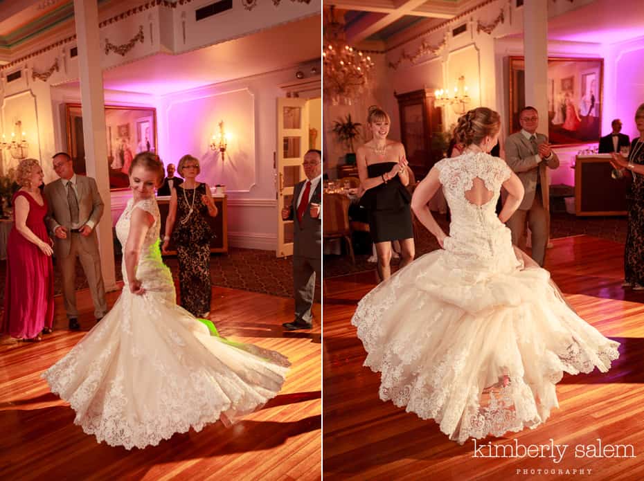 bride dancing - lace dress flares out