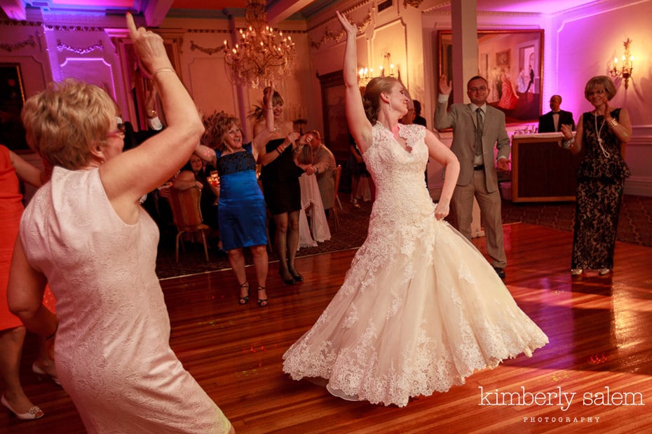 bride dances with guests