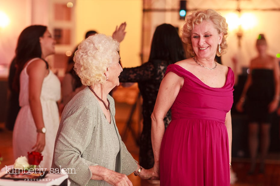 wedding guests head to the dance floor