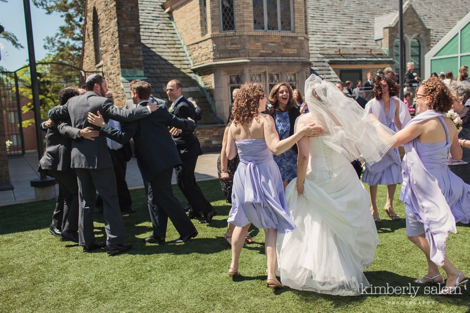 wedding party dancing on lawn