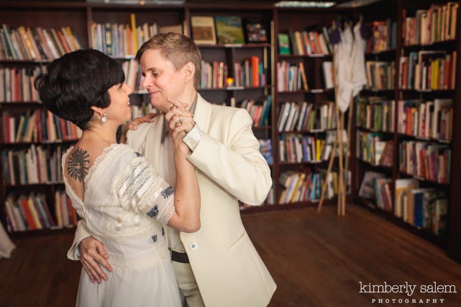 Brides during their first dance in the Housing Works Bookstore