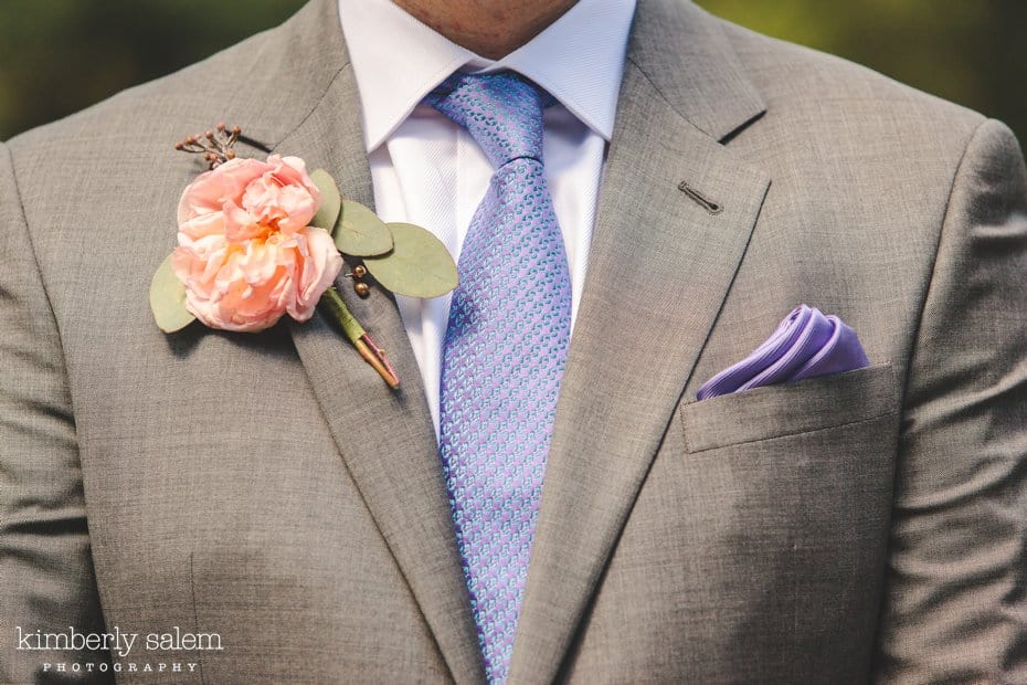 groom's grey suit detail with garden rose boutonniere