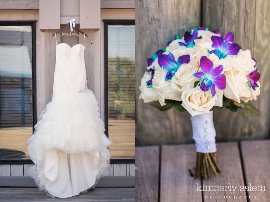 bridal gown and bridal bouquet detail - white roses and purple and blue orchids