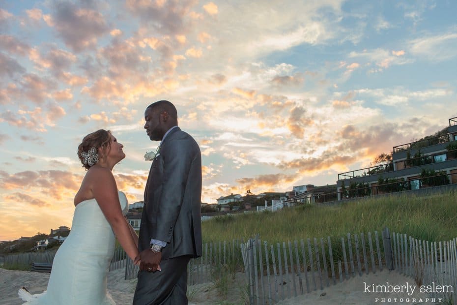 bride and groom portrait with sunset in background