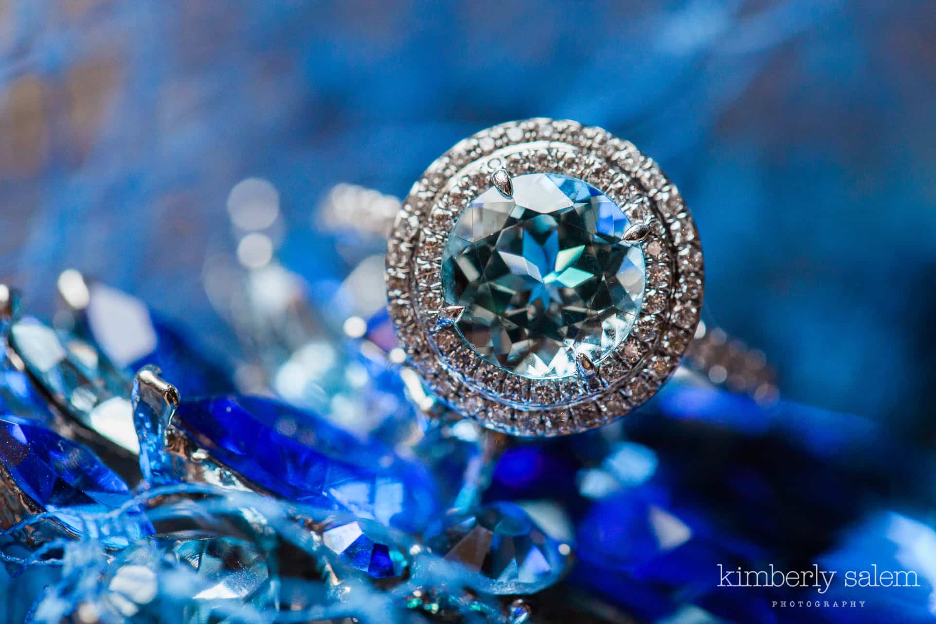 blue sapphire wedding ring with diamond halo