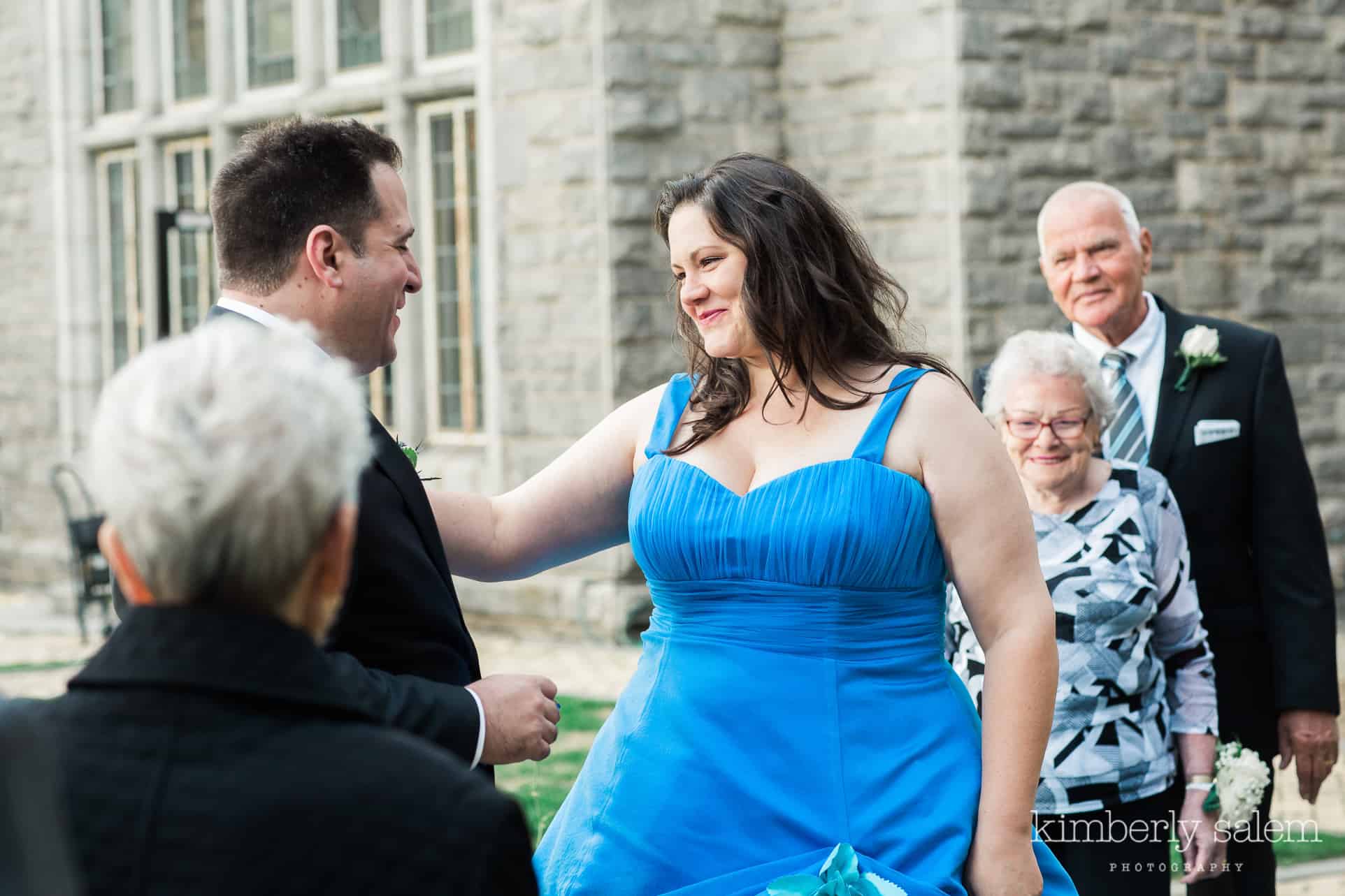 blue dress bride and her groom during handfasting ceremony