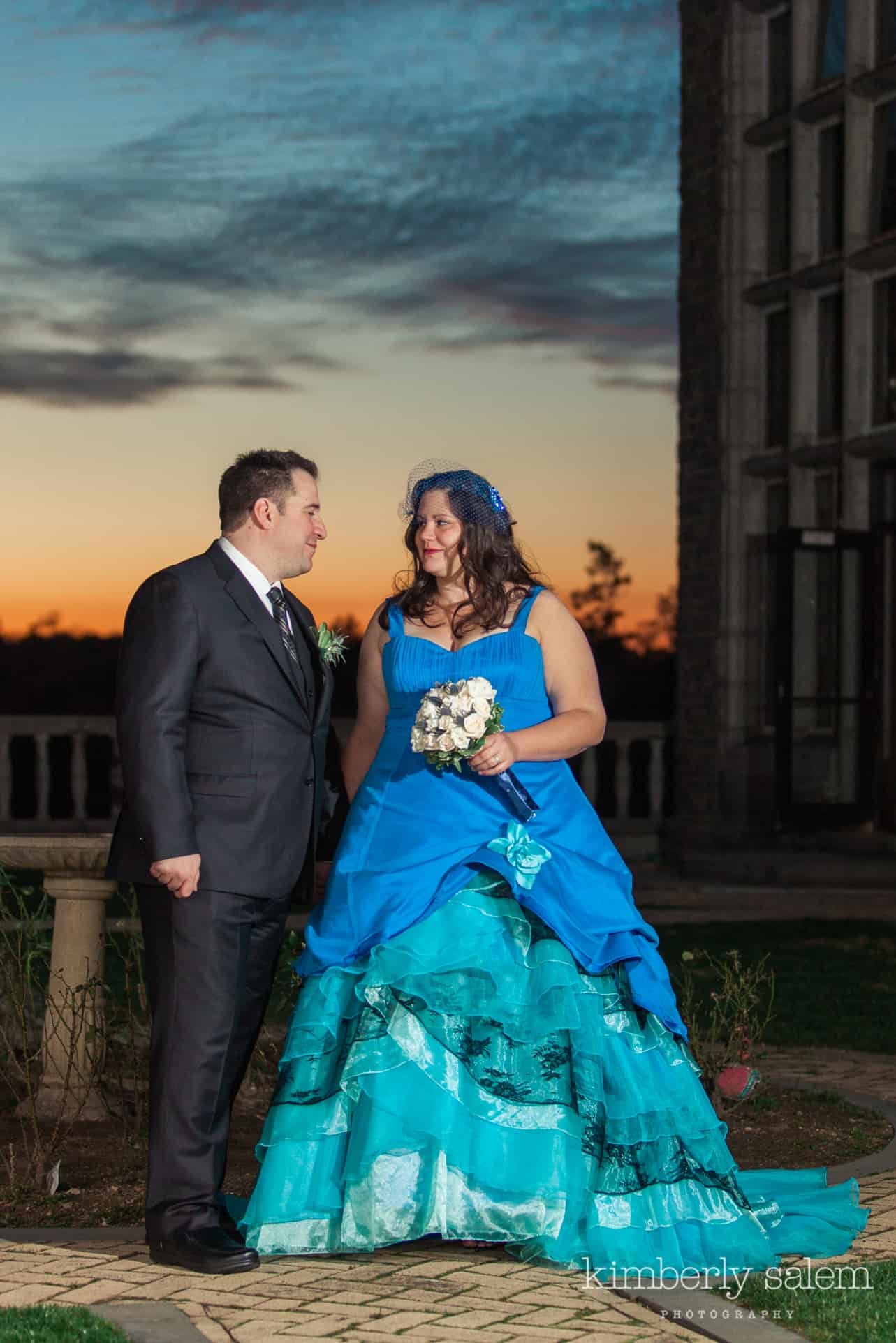 bride and groom at Reid Castle during sunset