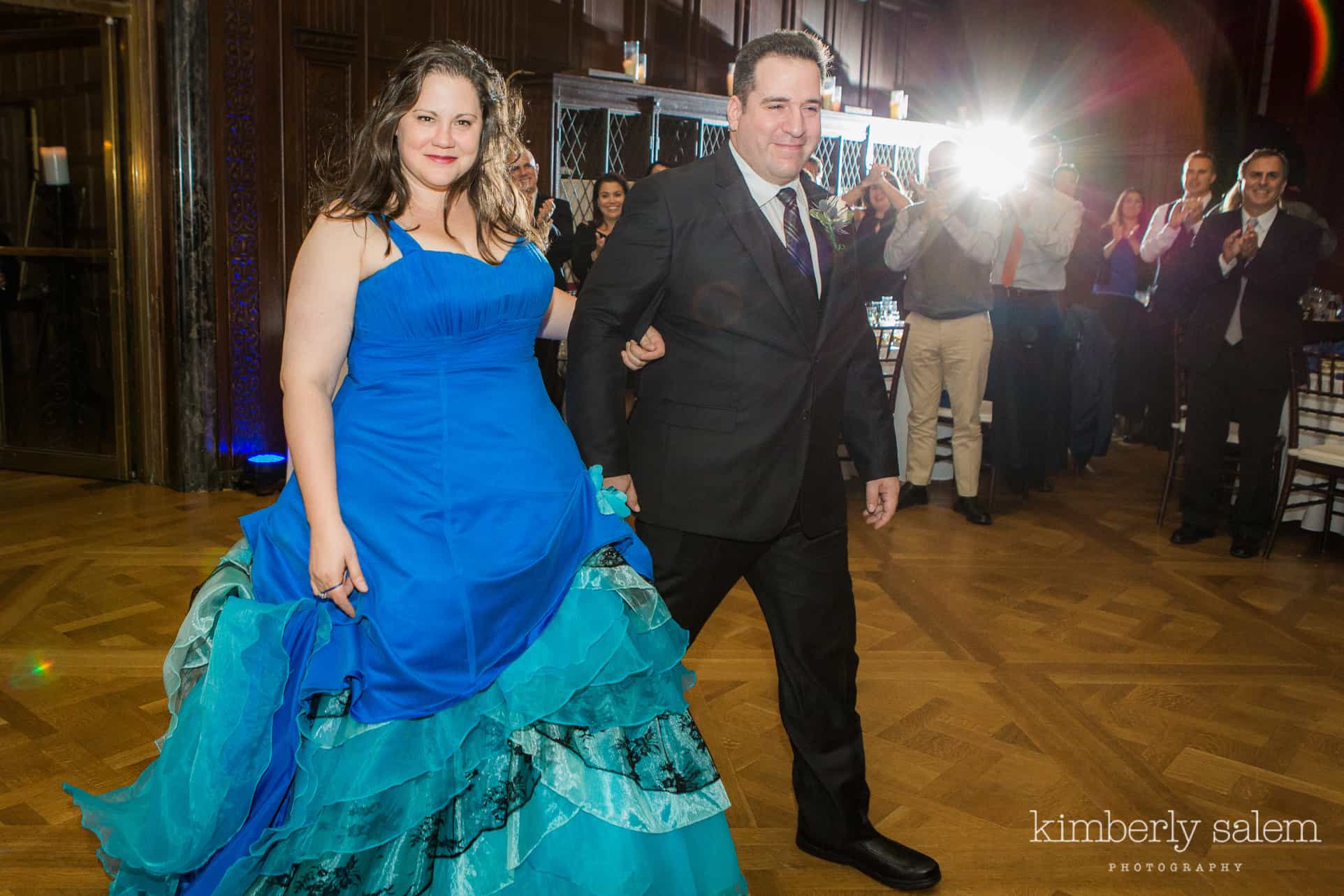 Bride and groom enter the reception at Reid Castle wedding